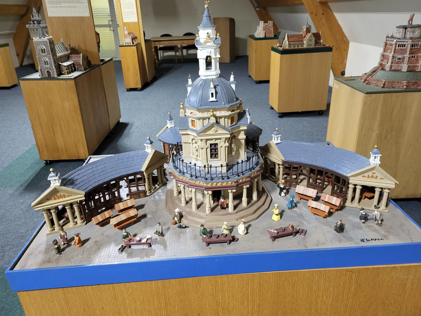 Detailed model of a domed historic building in the exhibition
