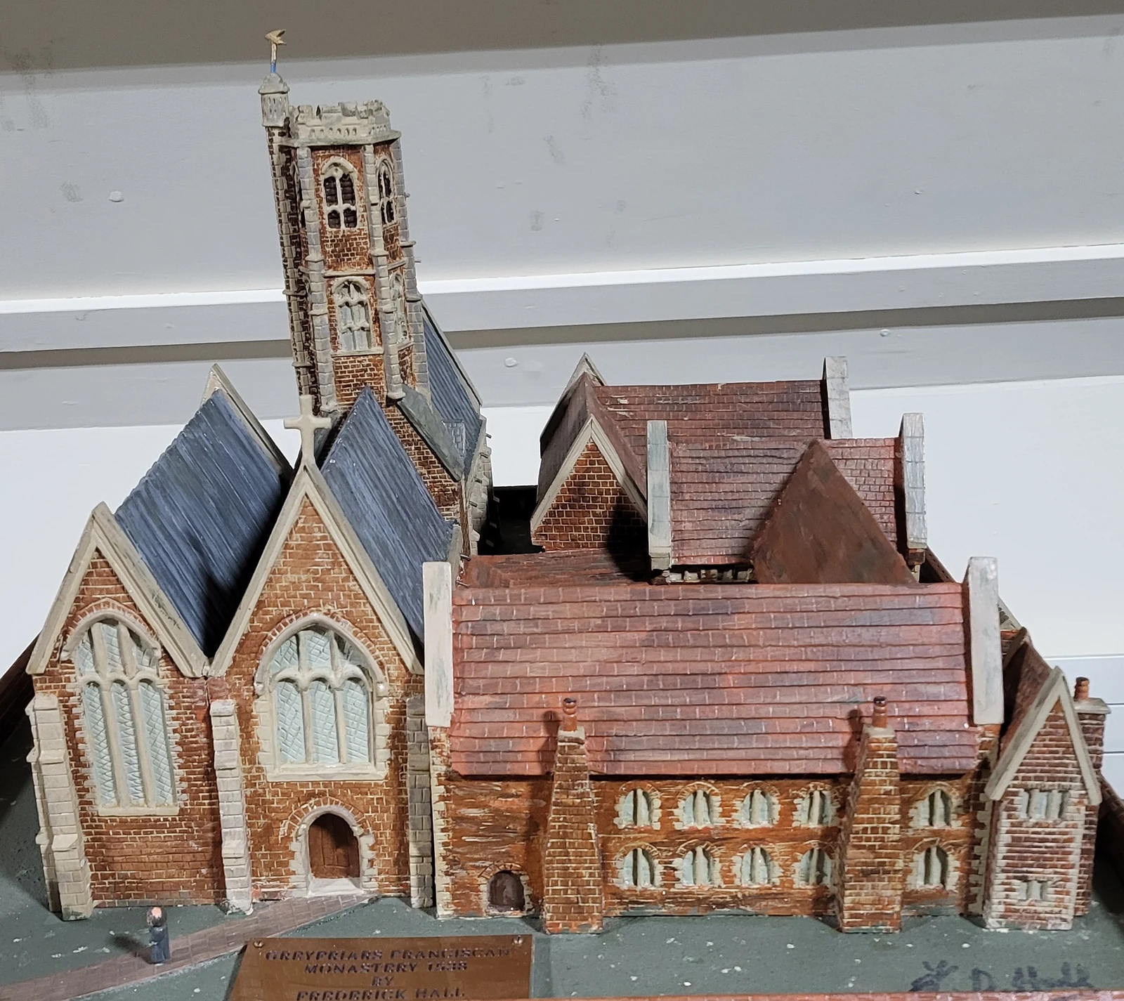 Church model viewed from the opposite side, showing its tower and red roofs